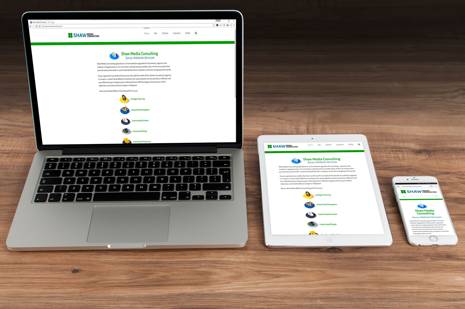 Shaw Media Consulting website displayed on multiple devices.